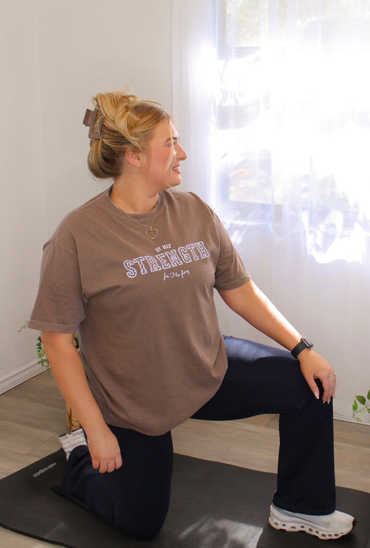 By His Strength Tee